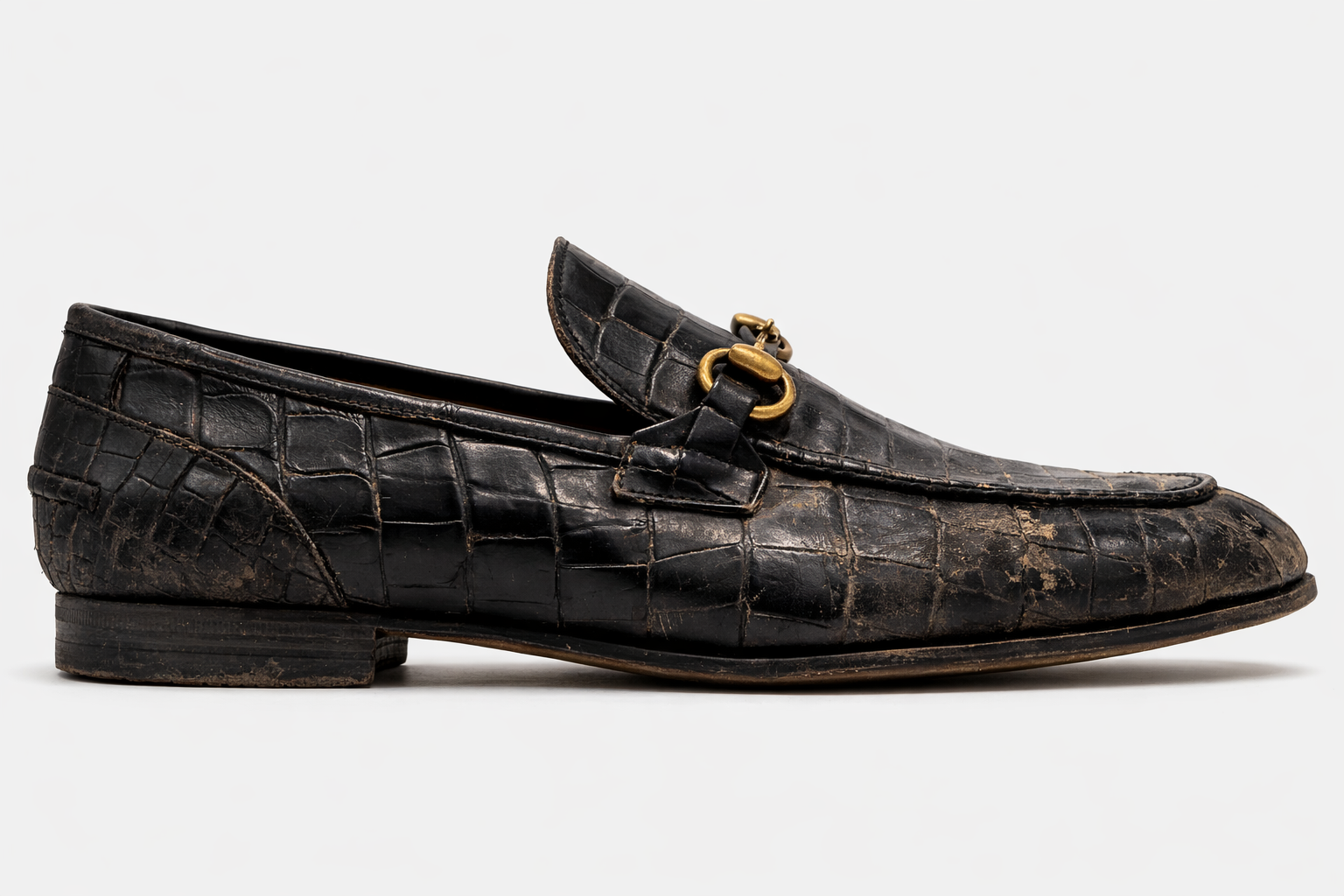 Worn leather shoes before restoration  Instacare Dubai